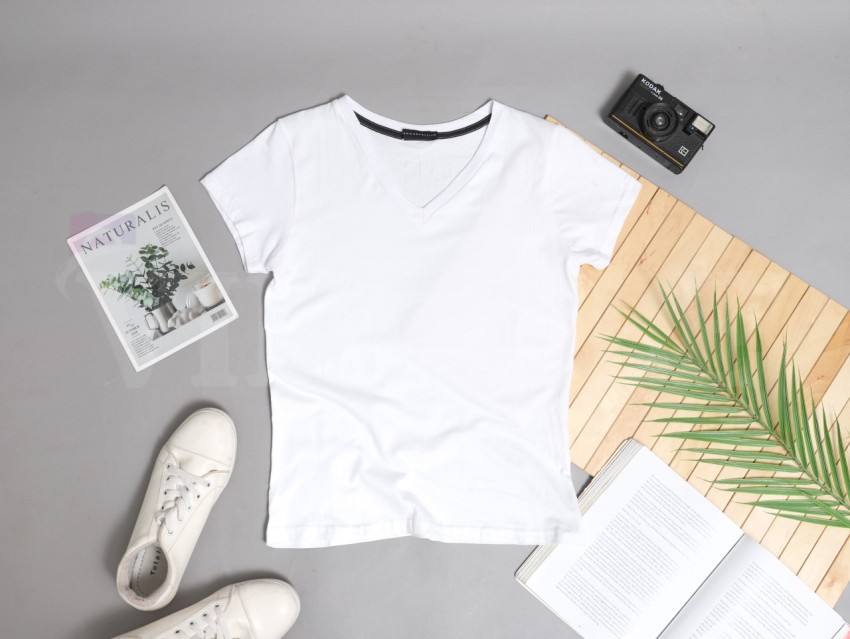 Top Flatlay style photo of a plain white t shirt mockup